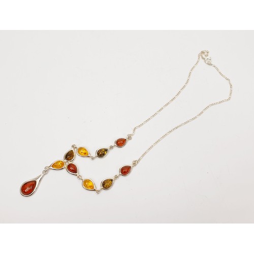 3 - A silver and amber set necklace, length 18