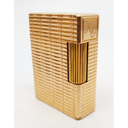 16 - A gold plated St Dupont pocket lighter, height 1.75