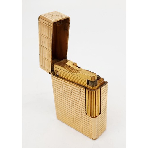 16 - A gold plated St Dupont pocket lighter, height 1.75