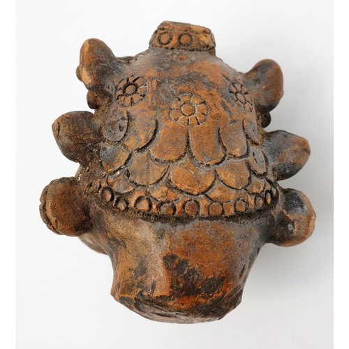 17 - An antique terracotta statue head depicting the Tibetan/Nepalese deity Mahakala, height 2.75