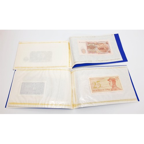 18 - Ten folders of the Rothman's Cambridge Collection of Rare Bank Notes. UK shipping £14.