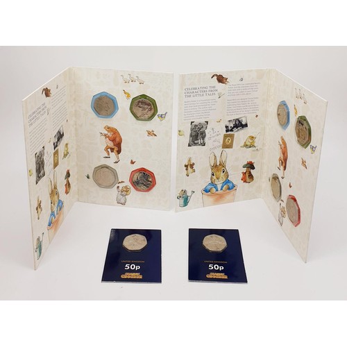 20 - Two Royal Mint Beatrix Potter and her Little Tales collectable 50p pieces and two uncirculated Charl... 