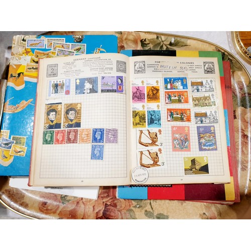 72 - Stamp albums. UK shipping £14.