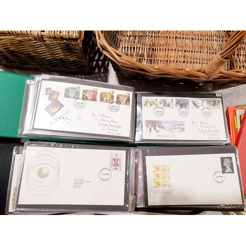 71 - A selection of first day covers and a stamp album. UK shipping £14.