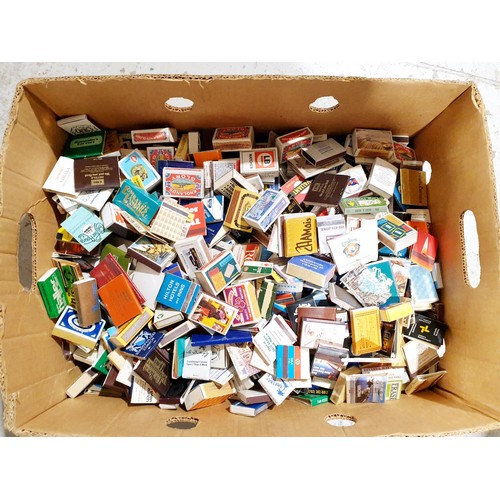 84 - A box of matchboxes and books. No shipping. Arrange collection or your own packer and shipper, pleas... 