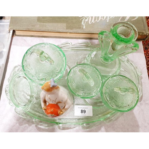 89 - An Art Deco green glass dressing table set and a ceramic figure. No shipping. Arrange collection or ... 