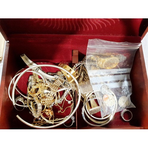 97 - A jewellery box containing costume jewellery. UK shipping £14.