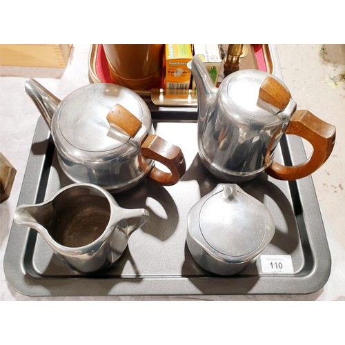 110 - A four piece Picquot Ware tea set. No shipping. Arrange collection or your own packer and shipper, p... 