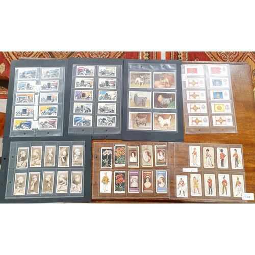 115 - A selection of cigarette cards. UK shipping £14.