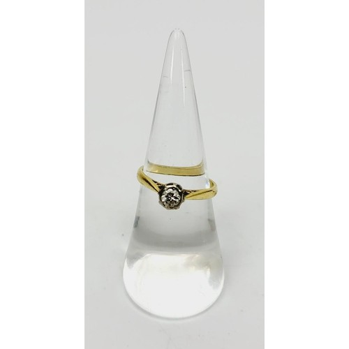 11 - An 18ct gold diamond solitaire ring, the diamond approx. a quarter of a carat, gross weight 2.4g, si... 