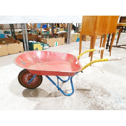 147 - A vintage Comet tin plate toy wheelbarrow. No shipping. Arrange collection or your own packer and sh... 