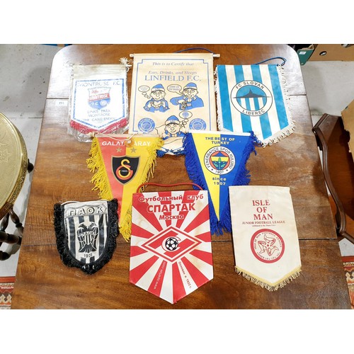 156 - Fourteen vintage European football pennants and caps including Rangers, Olympiakos and Spartak Mosco... 