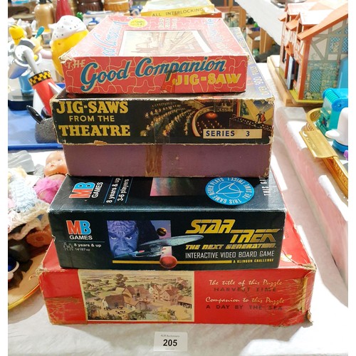 205 - Four vintage jigsaws and a Star Trek game. UK shipping £14.