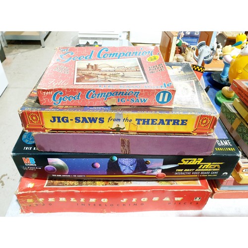 205 - Four vintage jigsaws and a Star Trek game. UK shipping £14.