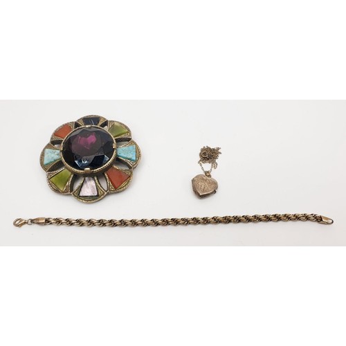 2 - A Scottish brooch set with hard stone, diameter 2.5