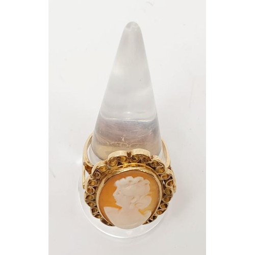 6 - A 9ct gold cameo ring, gross weight 6g, size U. UK shipping £14.