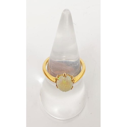 11 - A 22ct gold opal solitaire ring, gross weight 3.8g, size N. UK shipping £14.