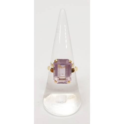 15 - A hallmarked 9ct gold ring set with purple stone, gross weight 3.3g, size N/O. UK shipping £14.