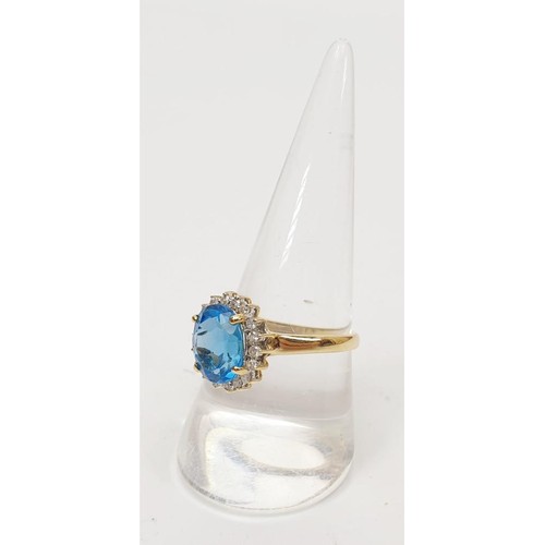 16 - A 9ct gold aquamarine and diamond cluster ring, gross weight 3.4g, size S/T. UK shipping £14.