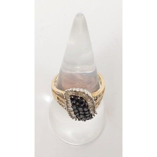 17 - A 9ct gold ring set with diamond and black stones, gross weight 5g, size P/Q. UK shipping £14.