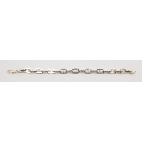 36 - A hallmarked silver bracelet, length 7.5