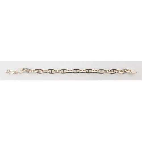 36 - A hallmarked silver bracelet, length 7.5