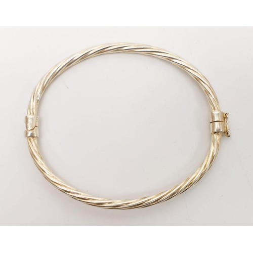 37 - A 925 silver bangle, weight 8.7g. UK shipping £14.