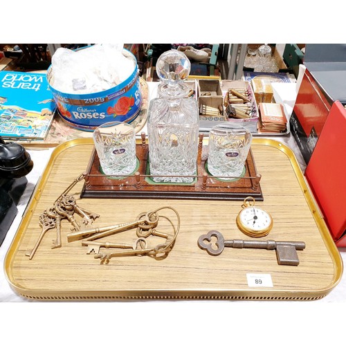 89 - A Royal Doulton cut crystal decanter with matching tumblers on a wooden stand together with assorted... 