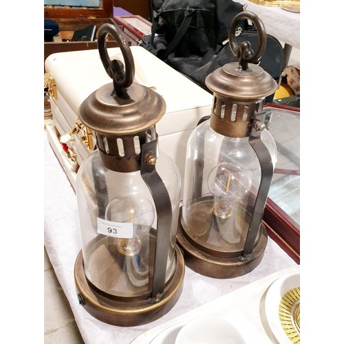 93 - Two battery operated decorative lights, height 13.5