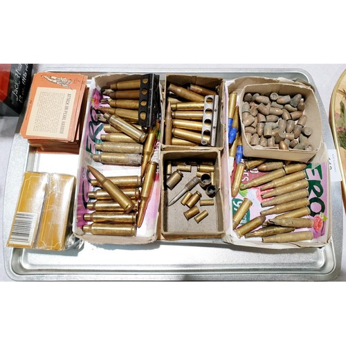 113 - Fired bullet cases and war related trading cards. UK shipping £14.