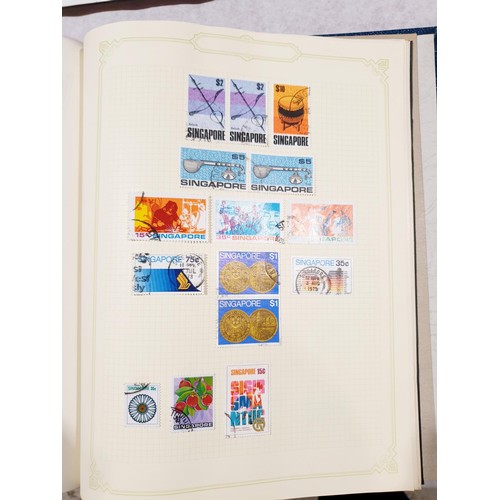 117 - Two stamp albums. UK shipping £14.