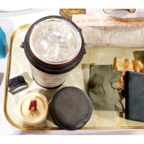 146 - A selection of military items including a World War II pilot's flask. UK shipping £14.