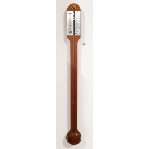 186 - A mahogany stick barometer and thermometer by Russell of Norwich, length 35