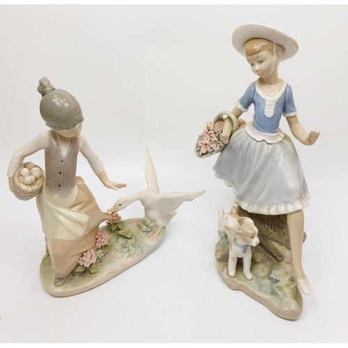 243 - A Lladro figure of a girl being chased by a goose, height 8