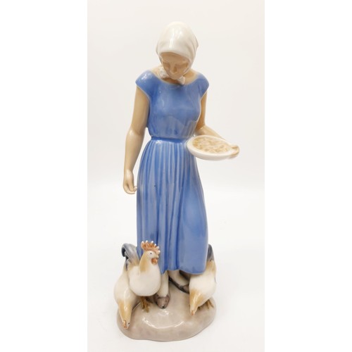 244 - A Bing & Grondahl figure of a girl feeding chickens, height 9.25