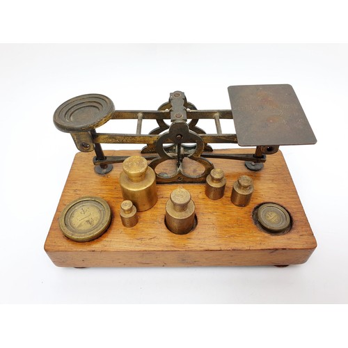 245 - A set of antique Morden & Co. postal scales, width 6.75