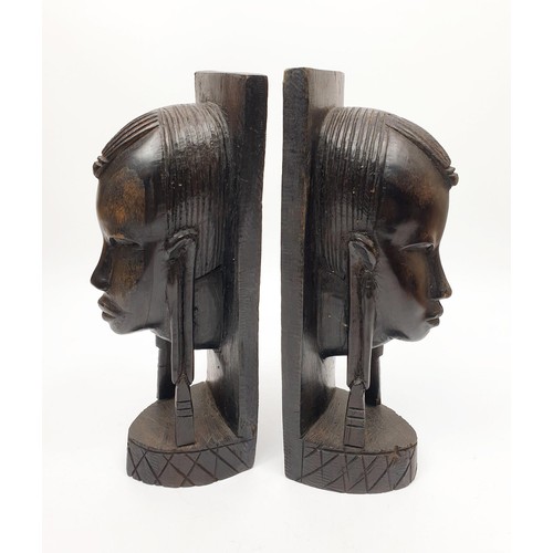 246 - A pair of carved wooden tribal bookends, height 9.75