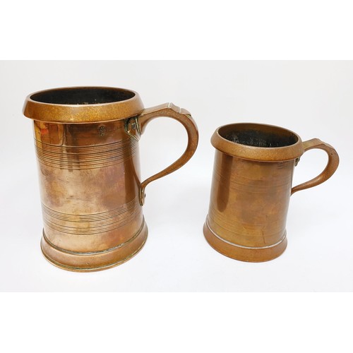 249 - Two Edwardian brass court tankards one a quart the other a pint by Farrow & Jackson, the tallest 6