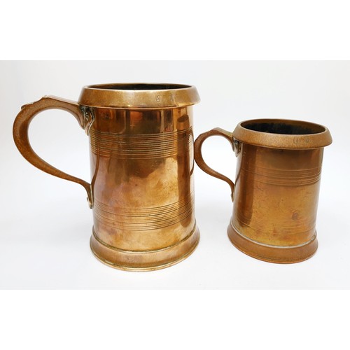 249 - Two Edwardian brass court tankards one a quart the other a pint by Farrow & Jackson, the tallest 6