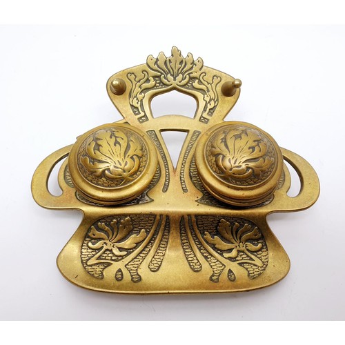 250 - An early 20th century brass ink well, width 6.25