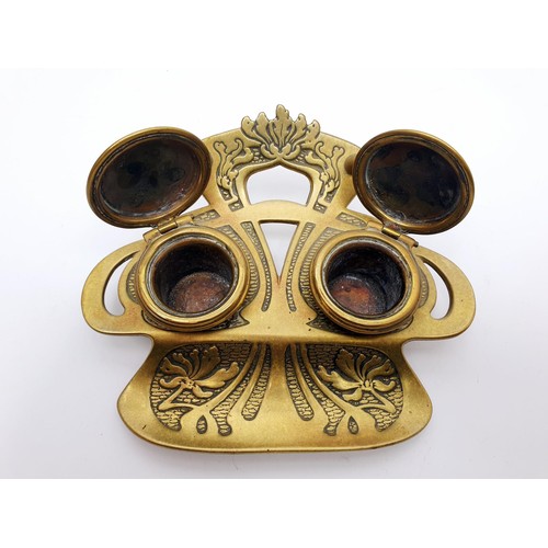 250 - An early 20th century brass ink well, width 6.25