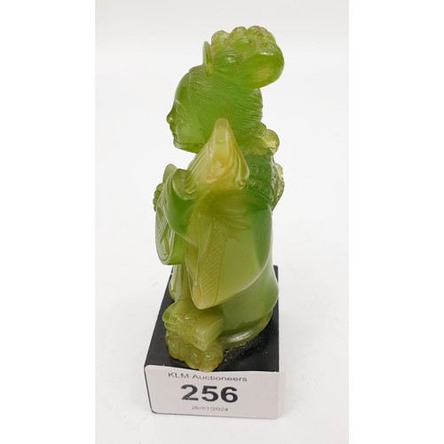 256 - A resin figure of a Chinese musician, height 4