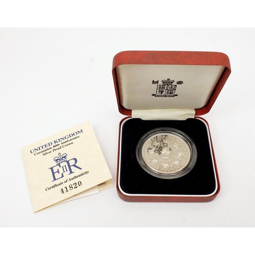 58 - A boxed 1993 Coronation 40th Anniversary silver proof £5 coin. UK shipping £14.