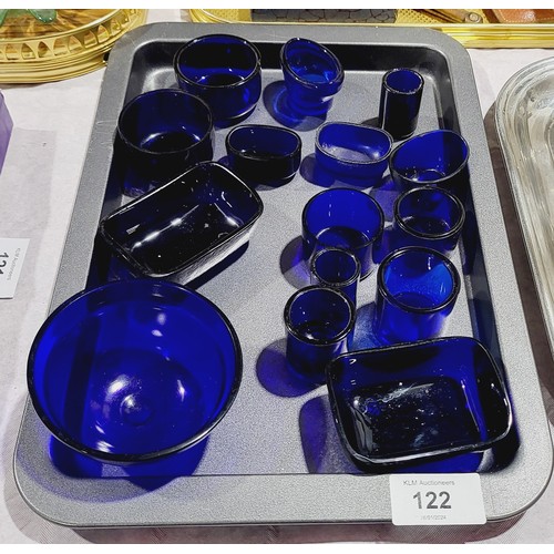 122 - A selection of blue glass condiment liners and an eye bath. No shipping. Arrange collection or your ... 