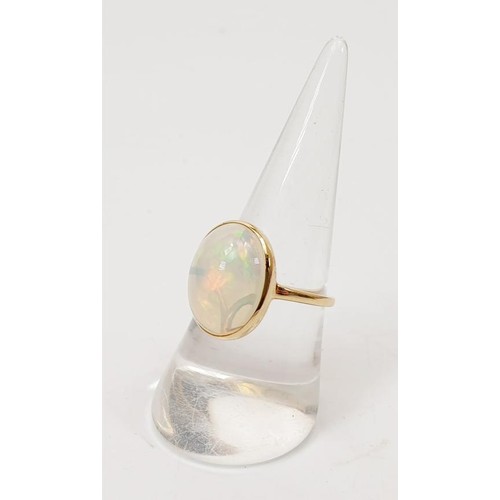 6 - A hallmarked 9ct gold moonstone solitaire ring, gross weight 3g, size P/Q. UK shipping £14.