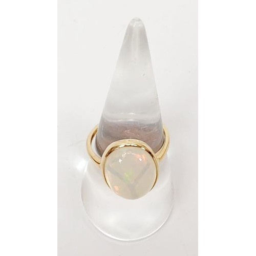 6 - A hallmarked 9ct gold moonstone solitaire ring, gross weight 3g, size P/Q. UK shipping £14.