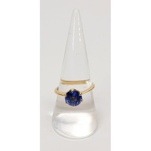 8 - A hallmarked 18ct gold AAA tanzanite solitaire ring, gross weight 3.7g, size P/Q. UK shipping £14.