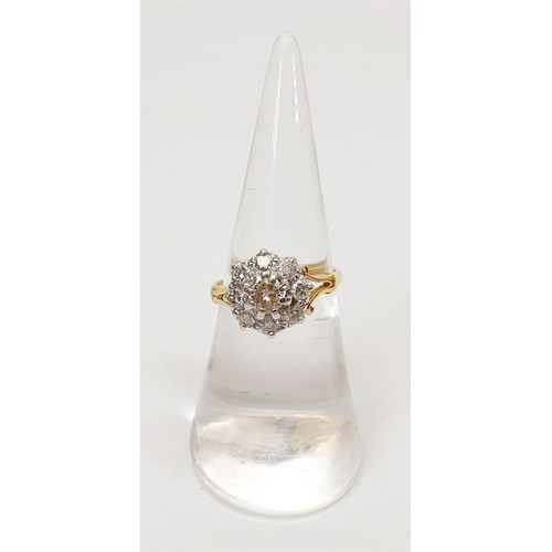 10 - A 1960s 18ct gold diamond cluster ring, gross weight 3.7g, size L. UK shipping £14.