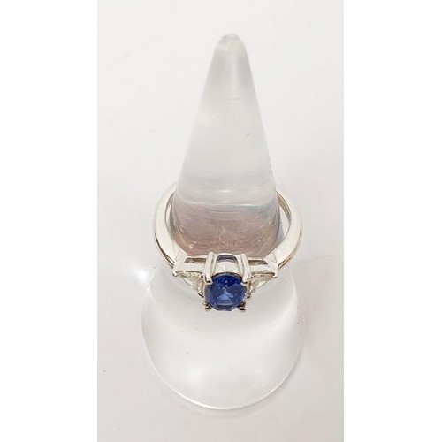 11 - A hallmarked 18ct white gold sapphire and diamond three stone ring, gross weight 3.3g, size K/L. UK ... 