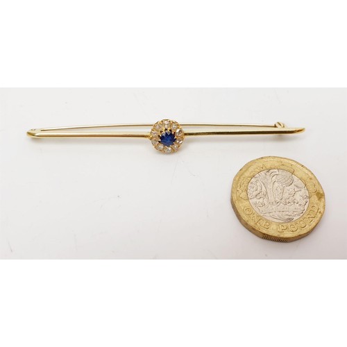 16 - A yellow metal diamond and sapphire cluster bar brooch, length 3